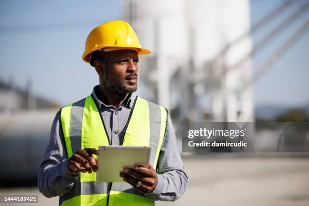 Workers looking at a laptop