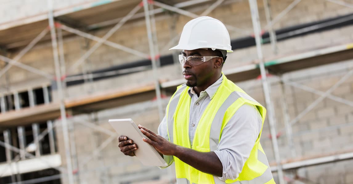 Man using tablet at job site